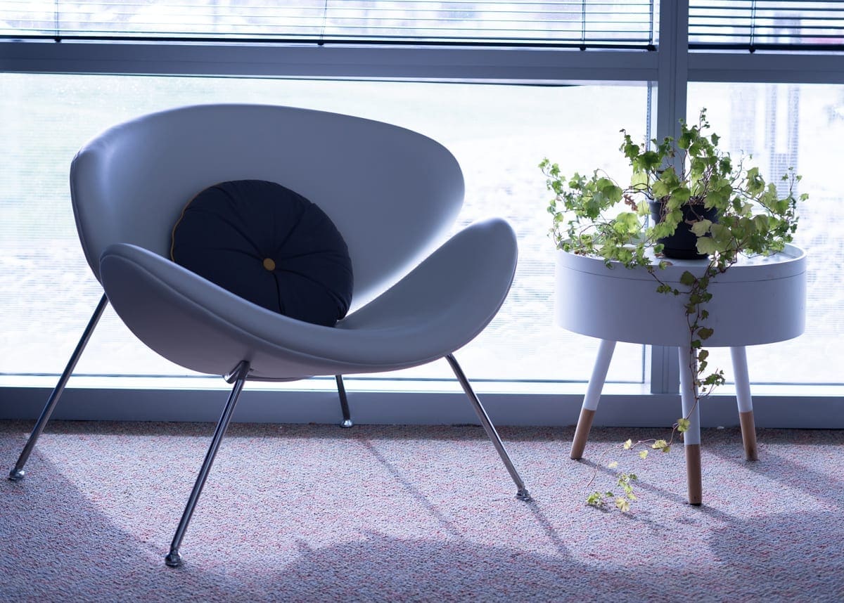 office chair with table and plant